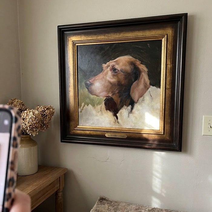 Customer's dog featured in their custom pet portrait, reviewed by Isla G.